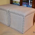 F32. Pair of nailhead trim Kirkland Furniture upholstered storage ottomans. 